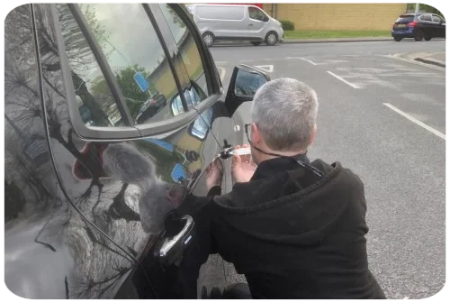 Locksmith Picking Car Lock